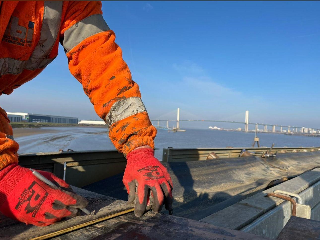 IBI engineer working on a conveyor belt joint on site