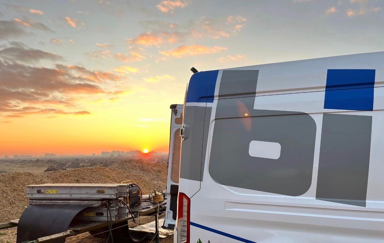 IBI conveyor service van at sunset on a quarry site